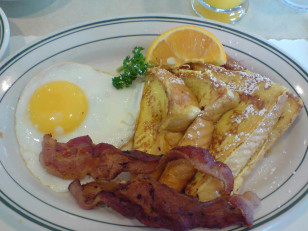 Bacon, French toast and eggs. (Photo by Flickr user Karl Baron via Creative Commons license) 