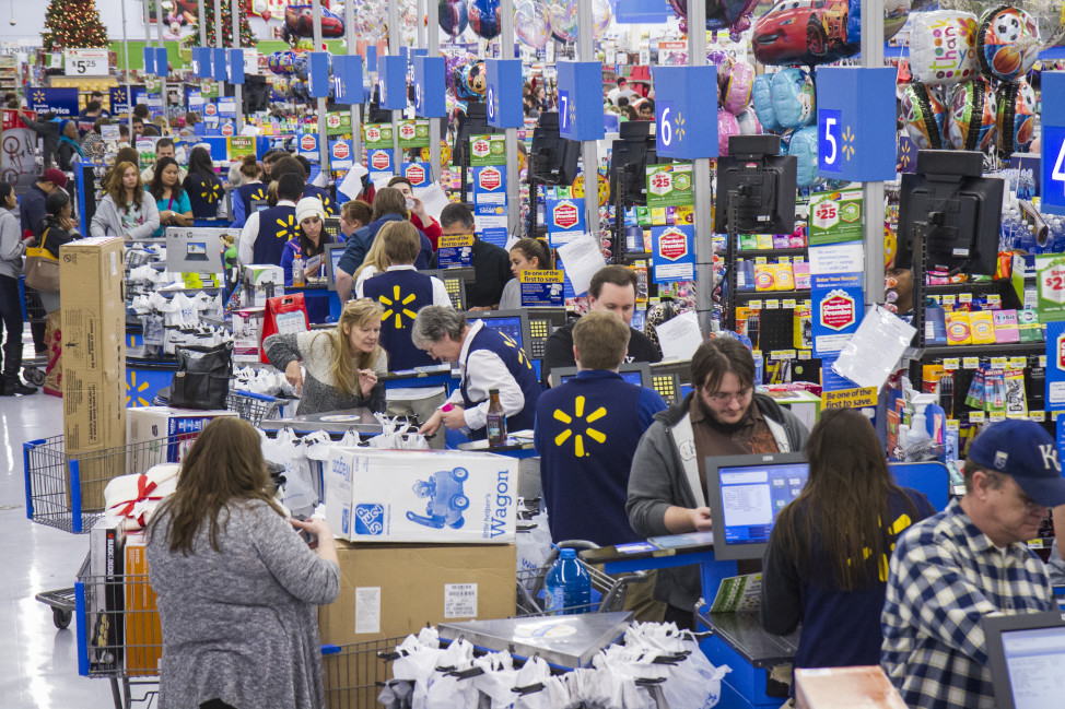 Sales clerks ring up customers at Walmart in Bentonville, Arkansas. More Americans work in retail than in any other occupation. (AP Photo)