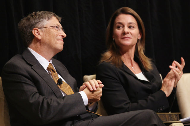 WASHINGTON - OCTOBER 15: Microsoft Corporation Chairman Bill Gates (L) and his wife Melinda attend a ceremony presenting them with the 2010 J. William Fulbright Prize for International Understanding at the Library of Congress October 15, 2010 in Washington, DC. The Fulbright Prize recognized the Gates' philanthropic work through the Bill and Melinda Gates Foundation and their work and charitable contributions in improving the health and education opportunities of people around the globe. (Photo by Win McNamee/Getty Images)