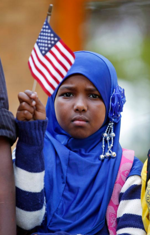 Minnesota's ethnic Somali population has mushroomed in the last two decades from a small group to more than 50,000. On September 27, 2013, hundreds, including Ilhan Issa, gathered at a solidarity rally in Minneapolis to protest terrorist attacks by Al-Shabab. (AP)