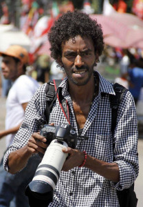 Al Jazeera journalists are not the only ones arrested in Egypt. This undated photograph shows Mohammed Abdel-Moneim, a photojournalist with Al-Badil newspaper, who was arrested with another photographer, Ahmed Hendawi from Yqeen online news network by Egyptian security forces while covering a demonstration in Cairo, Egypt, Friday, Dec. 6, 2013. Military prosecutors interrogated the two journalists arrested a day earlier during a protest organized by supporters of ousted President Mohammed Morsi in an eastern Cairo neighborhood, Rawda Ahmed, a lawyer at the Arab Network for Human rights Information, said Saturday.(AP Photo/Mohammed el-Shahed)