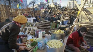 Food donations flow steadily into the Maidan protest city, enough to feed the thousands who come and go daily. Photo: Reuters/Gleb Garanich