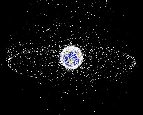 Orbital debris graphic that was computer generated from a distant oblique vantage point to provide a good view of the object population in the geosynchronous region (around 35,785 km altitude). (NASA Orbital Debris Program Office)