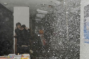 People take shelter as a ceiling collapses in a bookstore during the 9.0 magnitude earthquake in northeastern Japan, March 11, 2011 - (Photo: Reuters)