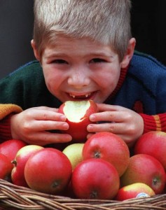 Healthy choice - boy eating an apple (Photo: AP Photo/Jacqueline Arzt)