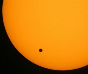 This June 8, 2004 file photo shows the transit of Venus, which occurs when the planet Venus passes between the Earth and the Sun, is pictured in Hong Kong. (AP Photo/Vincent Yu,File)