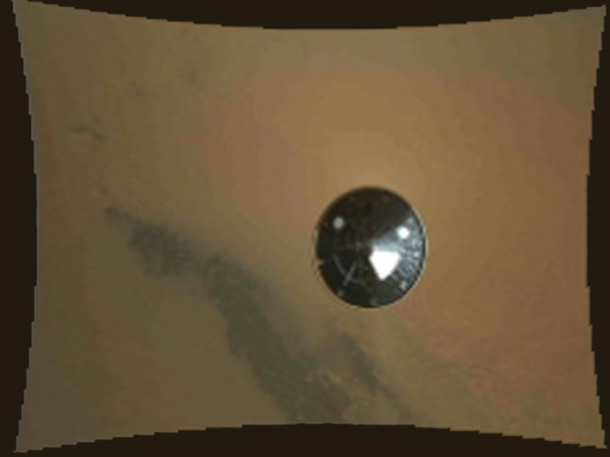 Curiosity's Heat Shield dropping away as seen by during its descent to the surface of Mars on Aug. 6, 2012 (Photo: NASA/JPL-Caltech/MSSS)