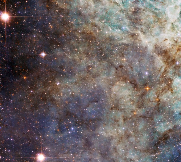 Turning its eye to the Tarantula Nebula, the NASA/ESA Hubble Space Telescope has taken this close-up of the outskirts of the main cloud of the Nebula. The Tarantula Nebula is located in the Large Magellanic Cloud, one of our neighboring galaxies, and situated at a distance of 170,000 light-years away from Earth. (Photo: European Space Agency/Judy Schmidt)