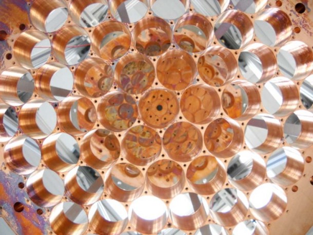 Scientists will soon conduct experiments to hunt for one of nature's most elusive particles, "dark matter."  An important tool to be used in the experiment is the Large Underground Xenon (LUX) detector.  Here’s a top-down view of the copper photomultiplier tube mounting structure, which is a key component of the detector.  (Photo: Lawrence Livermore National Laboratory)