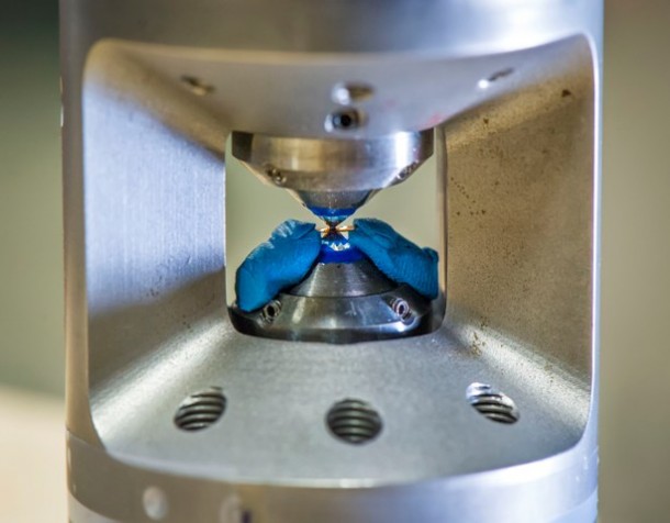 This is a diamond anvil cell (DAC). This device has been used in experiments by scientists to recreate the pressure that exists deep inside planets. (Photo by Roy Kaltschmidt, Berkeley Lab)