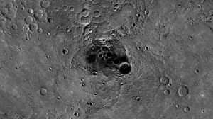 A large indentation at center, in the north polar region of Mercury has been shown to harbor water ice, thanks to measurements by the Messenger spacecraft. NASA/Johns Hopkins University Applied Physics Laboratory/Carnegie Institution of Washington)