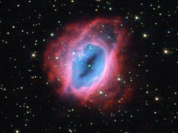 The planetary nebula known as ESO 456-67 as seen by the Hubble Space Telescope. Set against a backdrop of bright stars, the rust-colored object lies in the constellation of Sagittarius. (Image: ESA/Hubble & NASA)