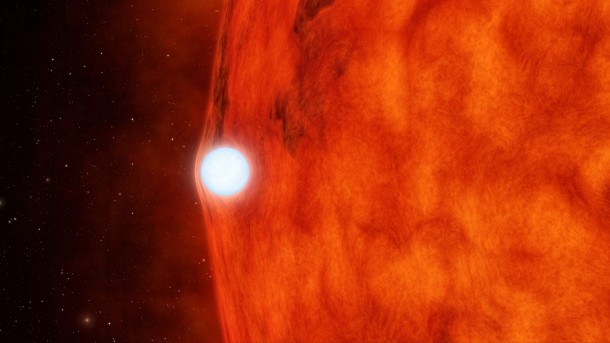 Artist’s concept of a dense, dead star called a white dwarf crossing in front of a small, red star. The white dwarf’s gravity is so great it bends and magnifies light from the red star. NASA’s Kepler space telescope recently observed this effect in a double-star system called KOI-256 (NASA/JPL-Caltech)