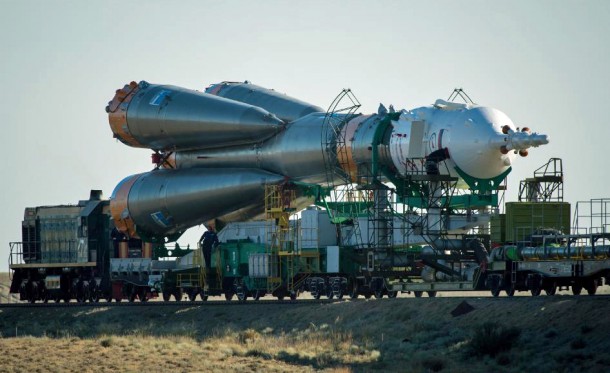 A Soyuz TMA-09M spacecraft is rolled out by train on Sunday, May 26, 2013 to the Baikonur Cosmodrome launch pad in Kazakhstan. (NASA/Bill Ingalls)