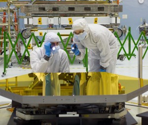 Technicians inspect primary mirror segments that will be used on the James Webb Space Telescope. (NASA/Chris Gunn)