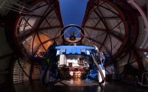 The Magellan Telescope with MagAO’s Adaptive Secondary Mirror (ASM) mounted at the top looking down on the 6.5m (21 foot) diameter Primary Mirror. (Yuri Beletsky, LCO/Magellan Staff)
