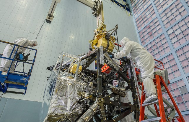 Engineers working inside the world's largest clean room located at NASA's Goddard Space Flight Center this week installed the Near Infrared Camera (NIRCam), into James Webb Space Telescope.  The NIRCam is considered to be an essential part of the new space telescope that's currently under construction. NASA is looking to launch the state of the art space telescope in 2018. (NASA/Chris Gunn) 