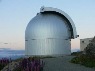 The Microlensing Observations in Astrophysics (MOA) telescope dome located atop Mount John on New Zealand's South Island (Aidan/ASGW via Flickr/Creative Commons)