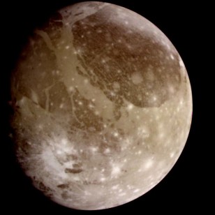 The Galileo spacecraft snapped this natural color view of Ganymede in 6/96 as it made its first encounter with the Jovian moon. (NASA/JPL)