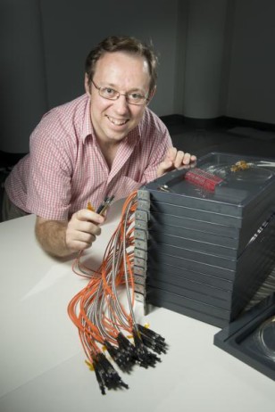 Scott Croom (CAASTRO/University of Sydney) with the SAMI instrument during its construction. (Tom Wheeler)