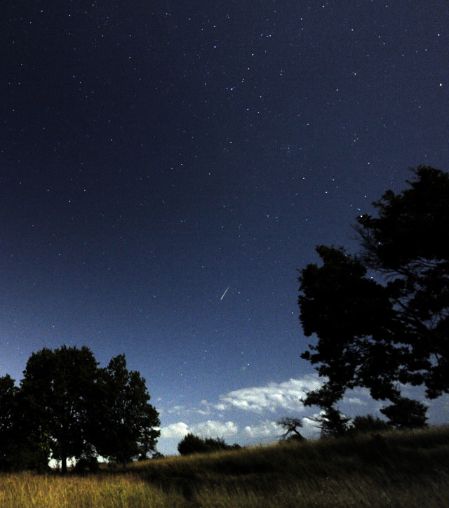 People throughout the world were recently treated to a show in the night skies during the annual Perseid meteor shower.  Here, in this long exposure photo taken on August 13, 2014, a meteor (center) falls through the atmosphere above the village of Blace, Macedonia (AP)