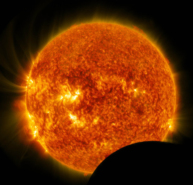 Here’s a shot of the moon crossing between NASA's Solar Dynamics Observatory (SDO) and the sun, during a phenomenon called a lunar transit on July 26, 2014.  This photo was taken by the SDO itself.  NASA says a lunar transit takes place about twice a year, causing a partial solar eclipse that can only be seen from SDO's point of view. (Reuters/NASA/SDO)