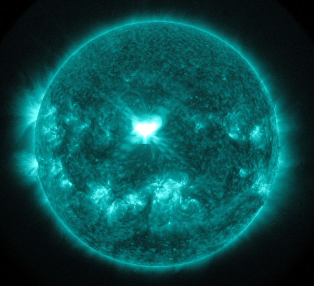 This is an extreme ultra-violet wavelength image of a powerful X1.6 class solar flare, which can be seen in the middle of the sun.  This image captured by NASA’s Solar Dynamics Observatory (SDO) on at 1745 UTC on Sept. 10, 2014. (NASA)