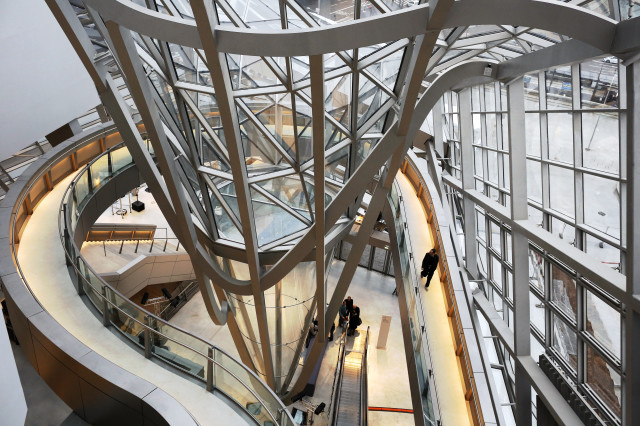 A visitor gets an early look at the "Musee des Confluences", a brand new science and anthropology museum in Lyon, France on 12/18/14.  The museum, designed by Austrian architect Wolf Dieter Prix officially opened its doors to the public on 12/20/14. (AP)