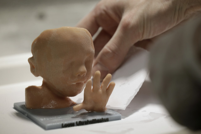 Expectant parents often receive a photograph of their unborn child taken in utero with ultrasound scanning.  Now, an Estonian technology company has taken this momentous event a step further by offering life-sized 3D printed renderings instead of the traditional grainy photograph.   Here a company technician puts the finishing touch on a model. (Reuters)
