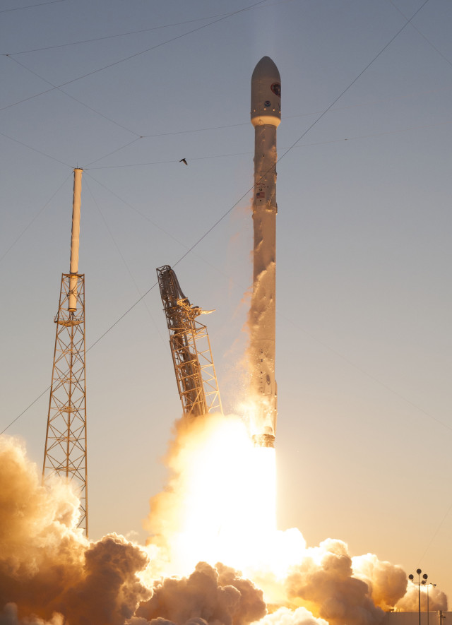 NOAA's Deep Space Climate Observatory Satellite which was carried aboard the SpaceX Falcon 9 rocket is shown here lifting off from launch pad 40 at the Cape Canaveral Air Force Station in Cape Canaveral, Florida 2/11/2015.  The new NOAA satellite will help keep tabs on solar storms and image Earth from nearly 1.6 million km away.  (Reuters) 