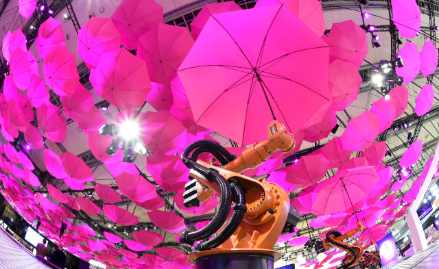 A robot installation is pictured at the booth of Deutsche Telekom at the CeBIT technology on 3/15/15.  The German technology exposition was held in Hanover from 3/16/15-3/20/15 (AFP)