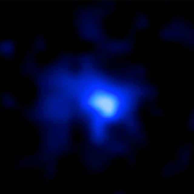 An international team of astronomers announced on 5/15/15 that they have discovered the most distant galaxy ever detected.  They measured the exact distance of EGS-zs8-1 (pictured in this Hubble image) and found that the galaxy is 13.1 billion light years away from Earth. The light from the galaxy now reaching Earth was produced back when the universe was only 5% of its present age. (Pascal Oesch and Ivelina Momcheva, NASA, European Space Agency)