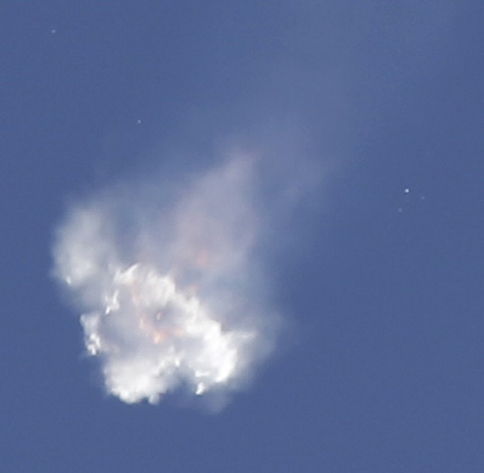 The SpaceX Falcon 9 rocket and Dragon spacecraft, carrying supplies to the International Space Station, breaks apart shortly after liftoff at the Cape Canaveral Air Force Station in Cape Canaveral, Florida., Sunday, June 28, 2015. (AP)