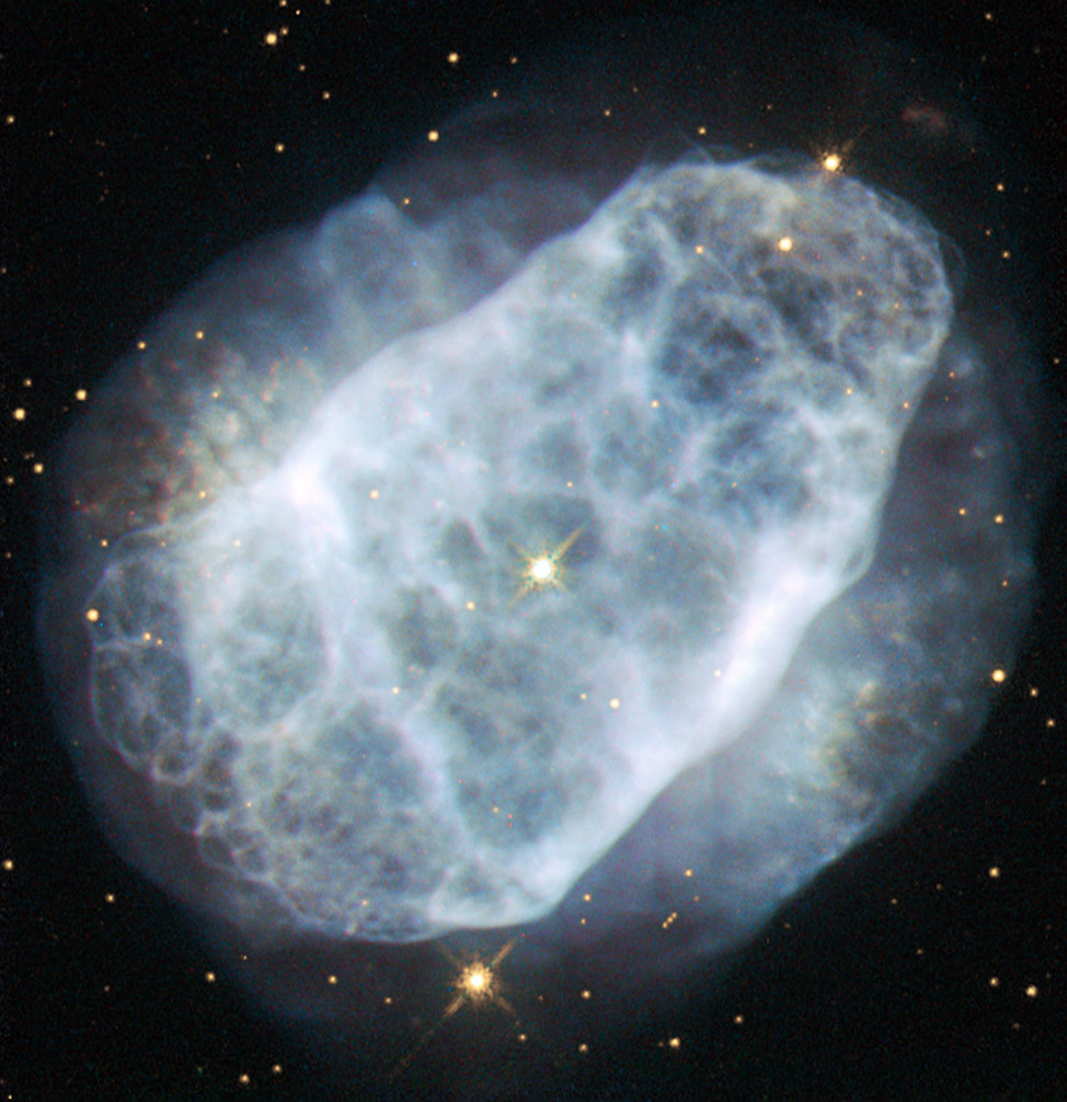 This NASA/ESA Hubble Space Telescope image, released on June 26, 2015, shows a planetary nebula named NGC 6153, located about 4,000 light-years away in the southern constellation of Scorpius. (ESA/Hubble & NASA)