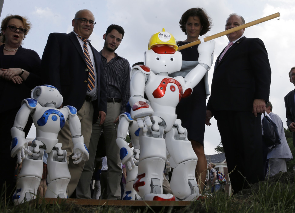 A robot took part in the groundbreaking ceremony for The College of New Jersey's planned $75 million science, technology, engineering and mathematics complex in Ewing, New Jersey on 7/7/15. (AP)