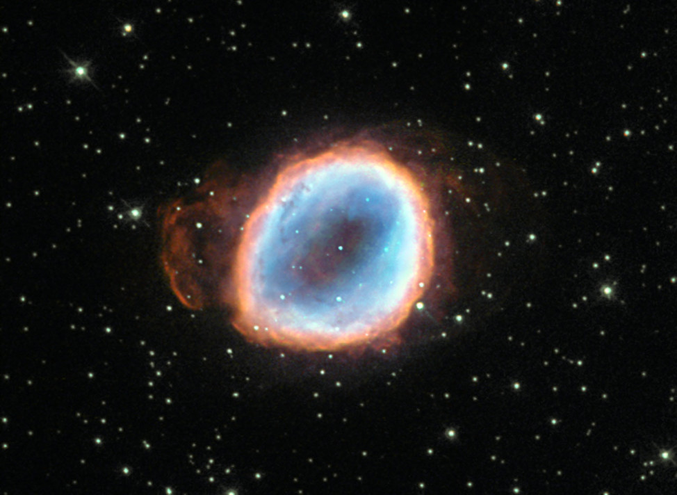 A dying star’s final moments are captured in this image from the NASA/ESA Hubble Space Telescope released on 7/27/15.  As the star was dying it burst into a planetary nebula known as NGC 6565. (ESA/Hubble & NASA)