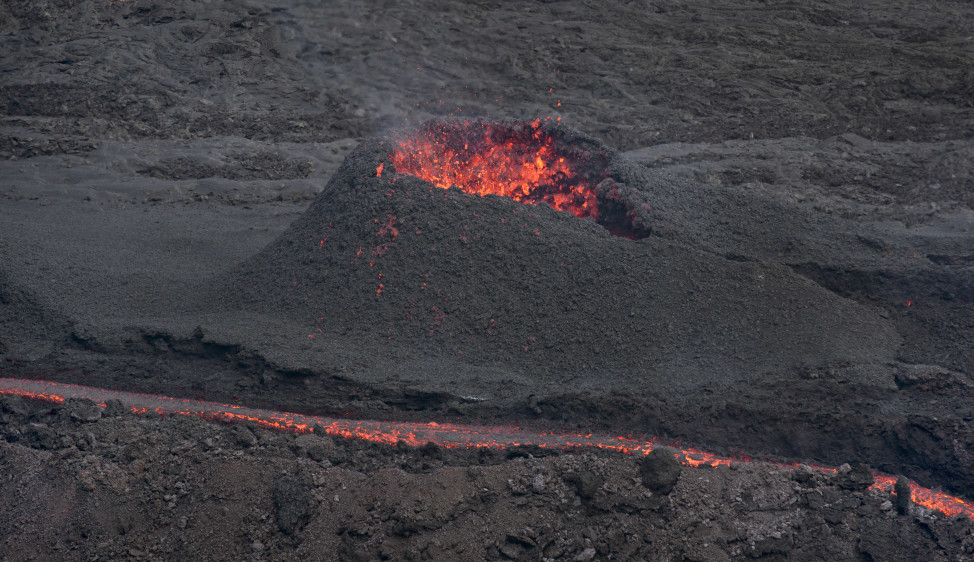 Lava erupts from the Piton de la Fournaise "Peak of the Furnace" volcano, on the southeastern corner of the Indian Ocean island of Reunion Saturday on 8/1/15.  Piton de la Fournaise is one of the most active volcanoes in the world is currently erupting on this Indian Ocean island. (AP)