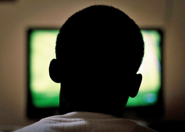 Watching television (Al Ibrahim via Flickr/Creative Commons)