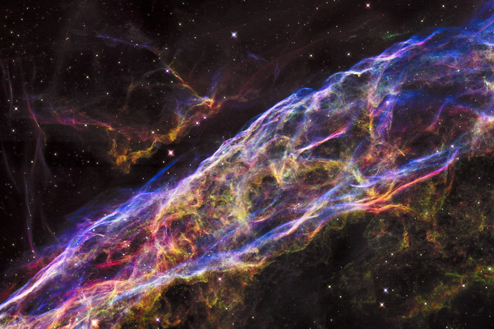 A new mosaic image captured by the NASA/ESA Hubble Space Telescope and released on 9/24/15 shows an incredibly detailed look at a small section of the remains of a massive star that exploded about 8,000 years ago.  Called the Veil Nebula, it is one of the best-known supernova remnants. The entire nebula is 110 light-years across and sits about 2,100 light-years away in the constellation Cygnus, the Swan. (NASA, ESA, and the Hubble Heritage Team (STScI/AURA))