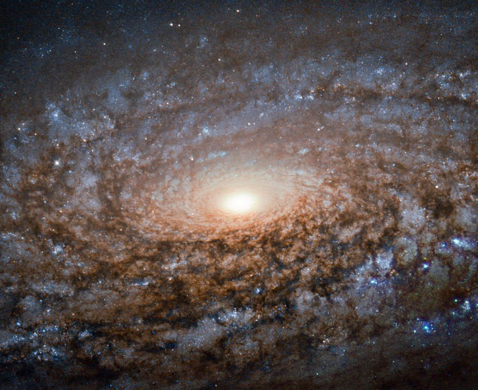This new image of the spiral galaxy NGC 3521 was captured by the NASA/ESA Hubble Space Telescope released on 9/21/15.  It’s a member of a class of galaxies known as flocculent spirals and is located almost 40 million light-years away in the constellation of Leo. (ESA/Hubble & NASA and S. Smartt (Queen's University Belfast))