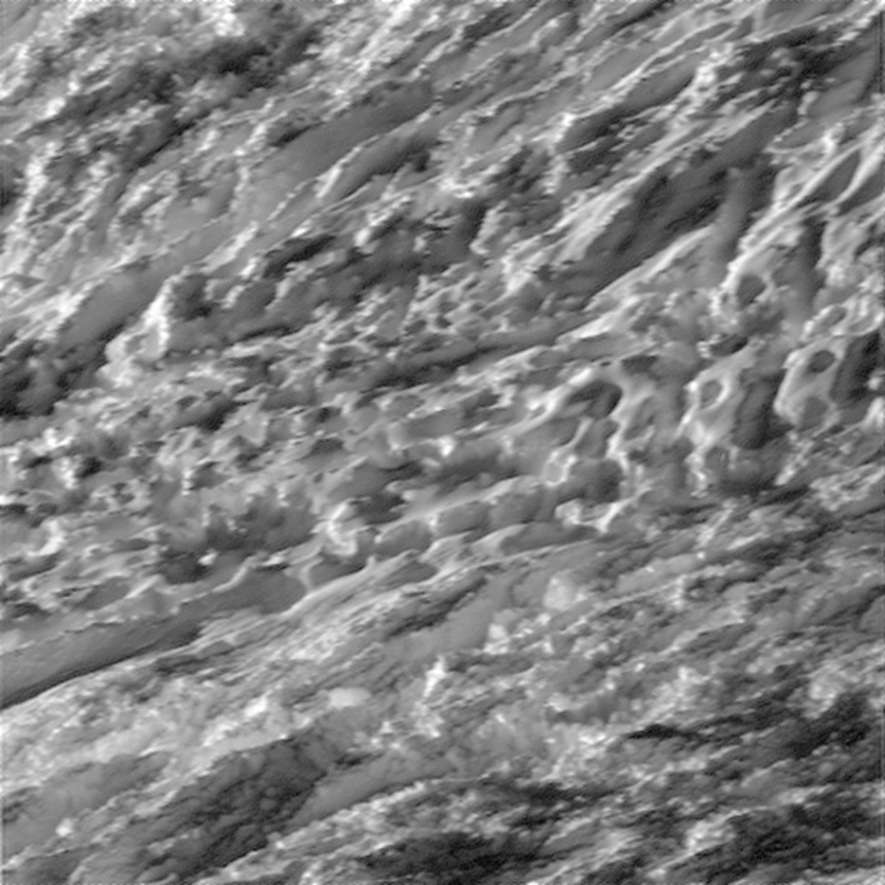 On 10/28/15 NASA's Cassini spacecraft flew close to the surface of Enceladus, one of Saturn’s moons.  The spacecraft captured images of the moon’s southern polar region. This image was taken in visible light with the Cassini spacecraft wide-angle camera from a distance of about 124 km above the moon’s surface (NASA/JPL-Caltech/Space Science Institute) 