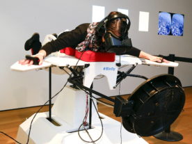 A visitor tries the flight simulator ‘Birdly’ at the exhibition "Animated Wonderworlds" at Zurich’s Museum for Design, 11/17/15. Birdly simulates the flight of a red kite over New York City, controlled by the entire body of the user. The flight simulator was developed by scientists at Zurich University of the Arts. (Reuters)