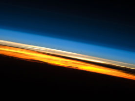 A view of Earth's atmosphere at sunset as seen by the International Space Station Expedition 23 crew in 2010. Colors here roughly denote the various layers of the atmosphere. (NASA)