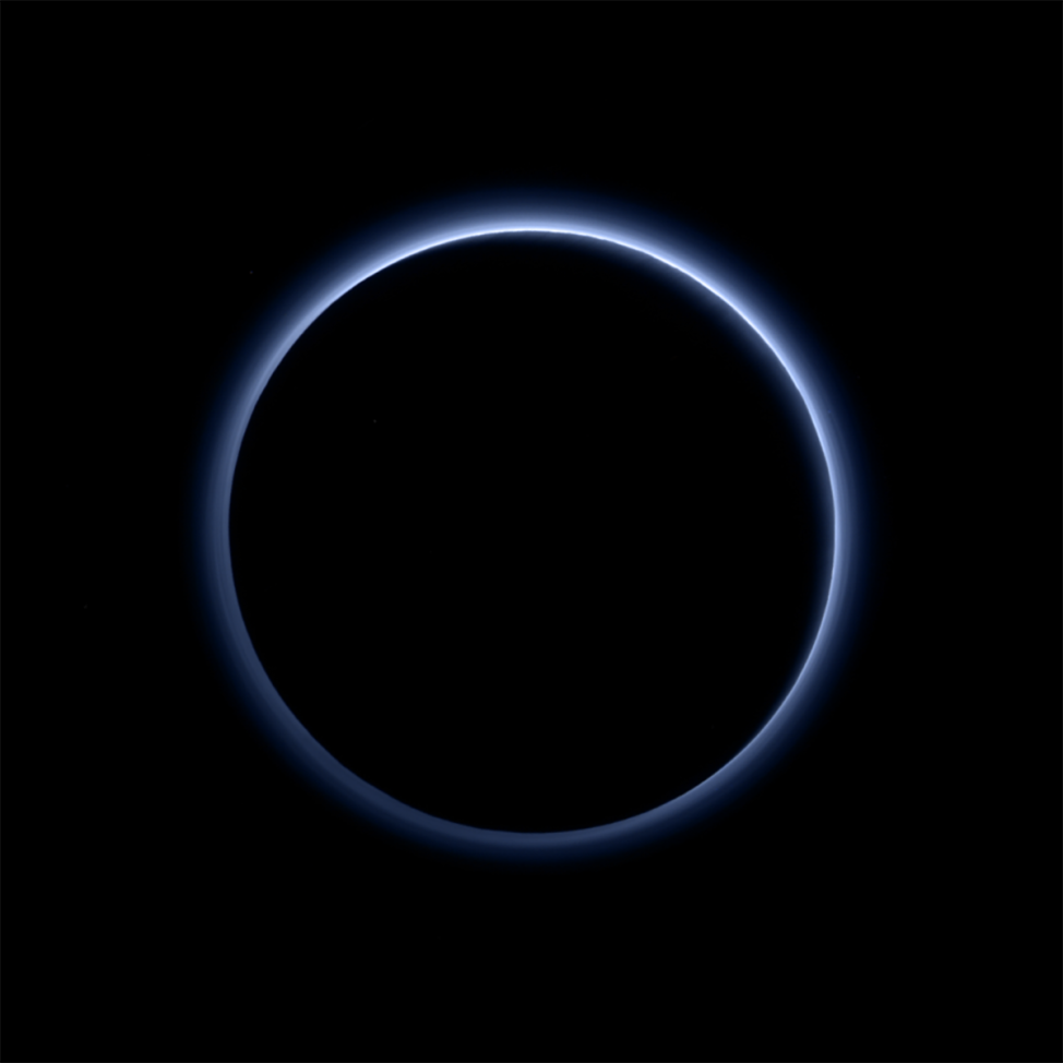 This image released by NASA on 10/8/15, shows the blue color of Pluto’s haze layer in this picture taken by the New Horizons spacecraft's MVIC or Ralph/Multispectral Visible Imaging Camera. (NASA/JHUAPL/SwRI)