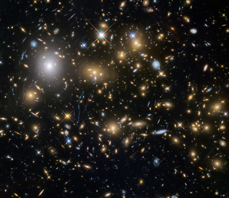 The Hubble Space Telescope recently gathered the largest sample of the faintest and earliest known galaxies in the universe. Some of these galaxies formed just 600 million years after the Big Bang. This is an image of the galaxy cluster MACS J0416.1–2403 that was released on 10/22/15. (ESA/NASA) 