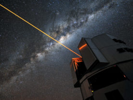 A 22W laser used for adaptive optics on the Very Large Telescope in Chile. A suite of similar lasers could be used to alter the shape of a planet's transit for the purpose of broadcasting or cloaking the planet. (ESO/G. Hüdepohl)