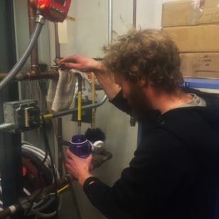 Polies, looking for fresh, untreated, 600 year old ice water, can quench their thirst at the aptly named "mineral water" spigot in the water treatment plant. (Photo by Refael Klein)