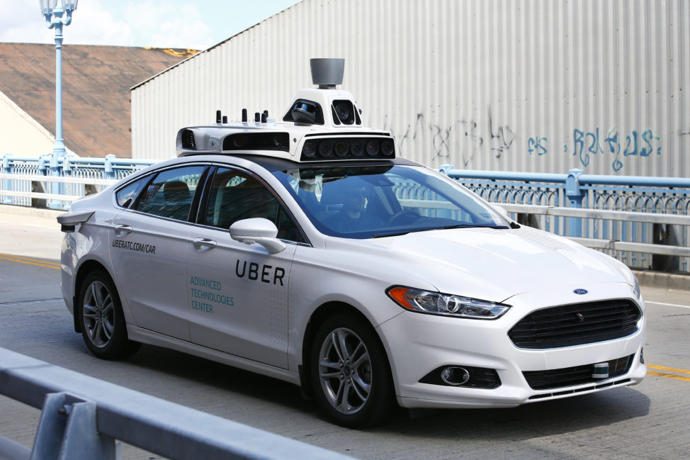 Another step towards driverless cars. Here Uber employees test the self-driving Ford Fusion hybrid cars in Pittsburgh, Pa on 8/18/16. (AP)