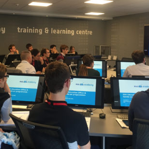 Instructor teaches a class at the ESA Training and Learning Center in Belgium ((C) ESA)