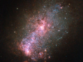 This NASA/ESA Hubble Space Telescope image, released 7/25/16, reveals the vibrant core of the galaxy NGC 3125. The galaxy is located about 50 million light-years away in the constellation of Antlia. (ESA/Hubble & NASA, Judy Schmidt)